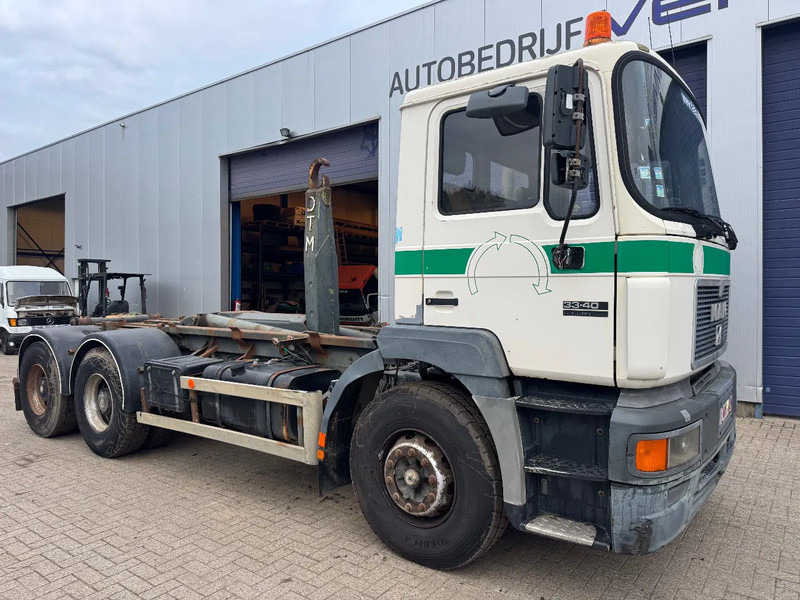 MAN 33.403 **BELGIAN TRUCK-FULL STEEL-MANUAL PUMP** - Camião polibenne: foto 3 MAN 33.403 **BELGIAN TRUCK-FULL STEEL-MANUAL PUMP** - Camião polibenne: foto 3