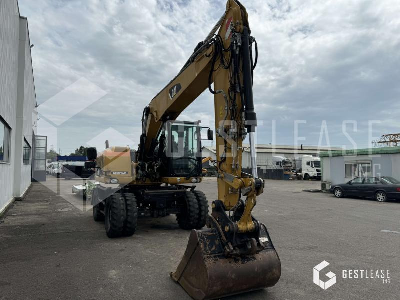 Caterpillar M313D - Escavadeira de rodas: foto 4 Caterpillar M313D - Escavadeira de rodas: foto 4
