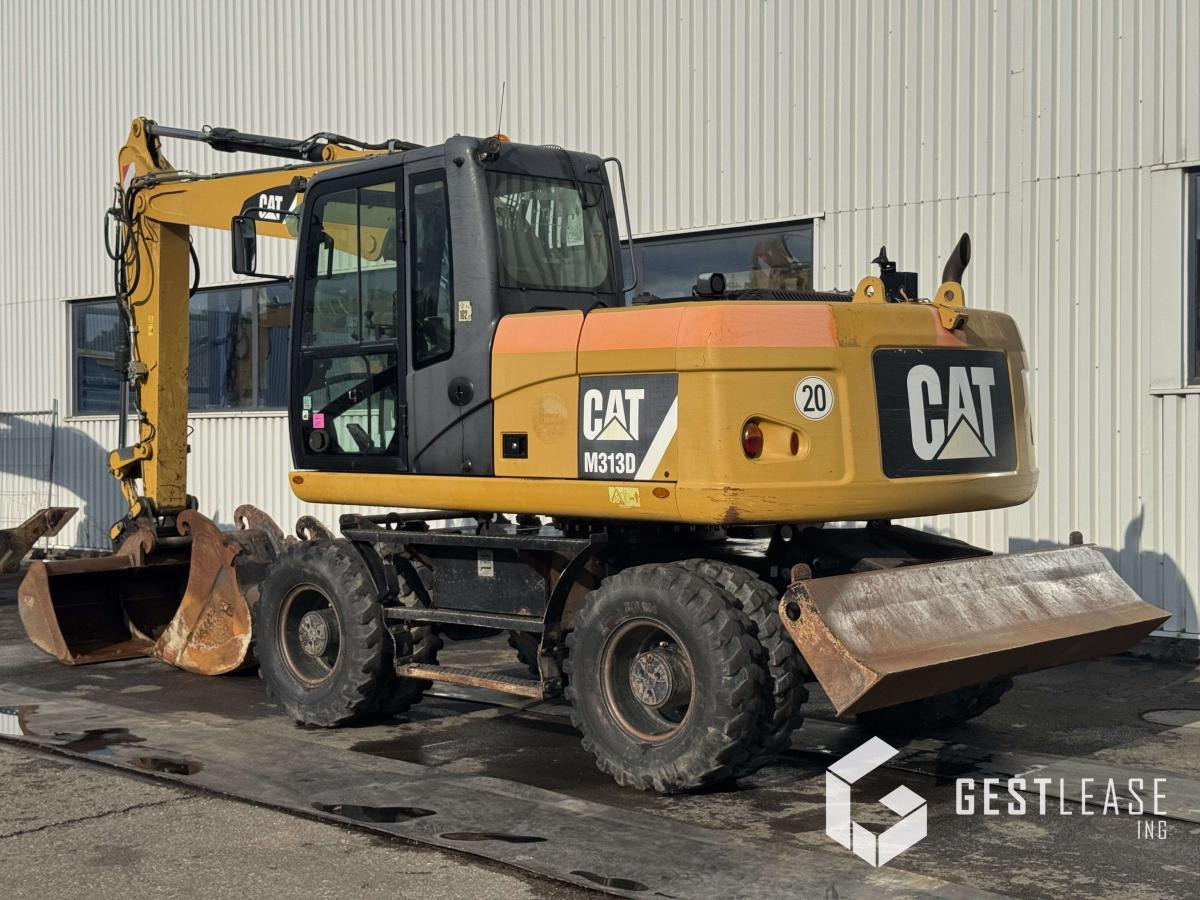 Caterpillar M313D - Escavadeira de rodas: foto 2 Caterpillar M313D - Escavadeira de rodas: foto 2