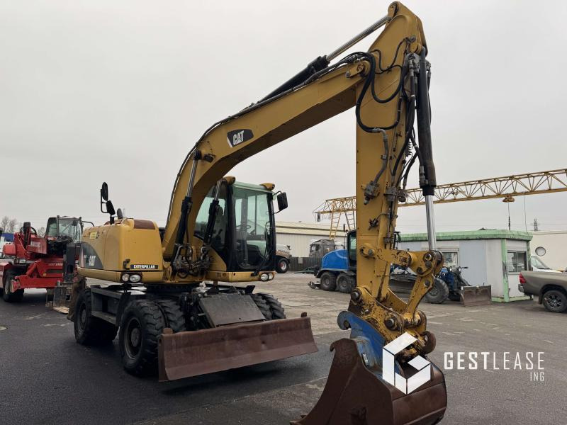 Caterpillar M313D Mono - Escavadeira de rodas: foto 4 Caterpillar M313D Mono - Escavadeira de rodas: foto 4