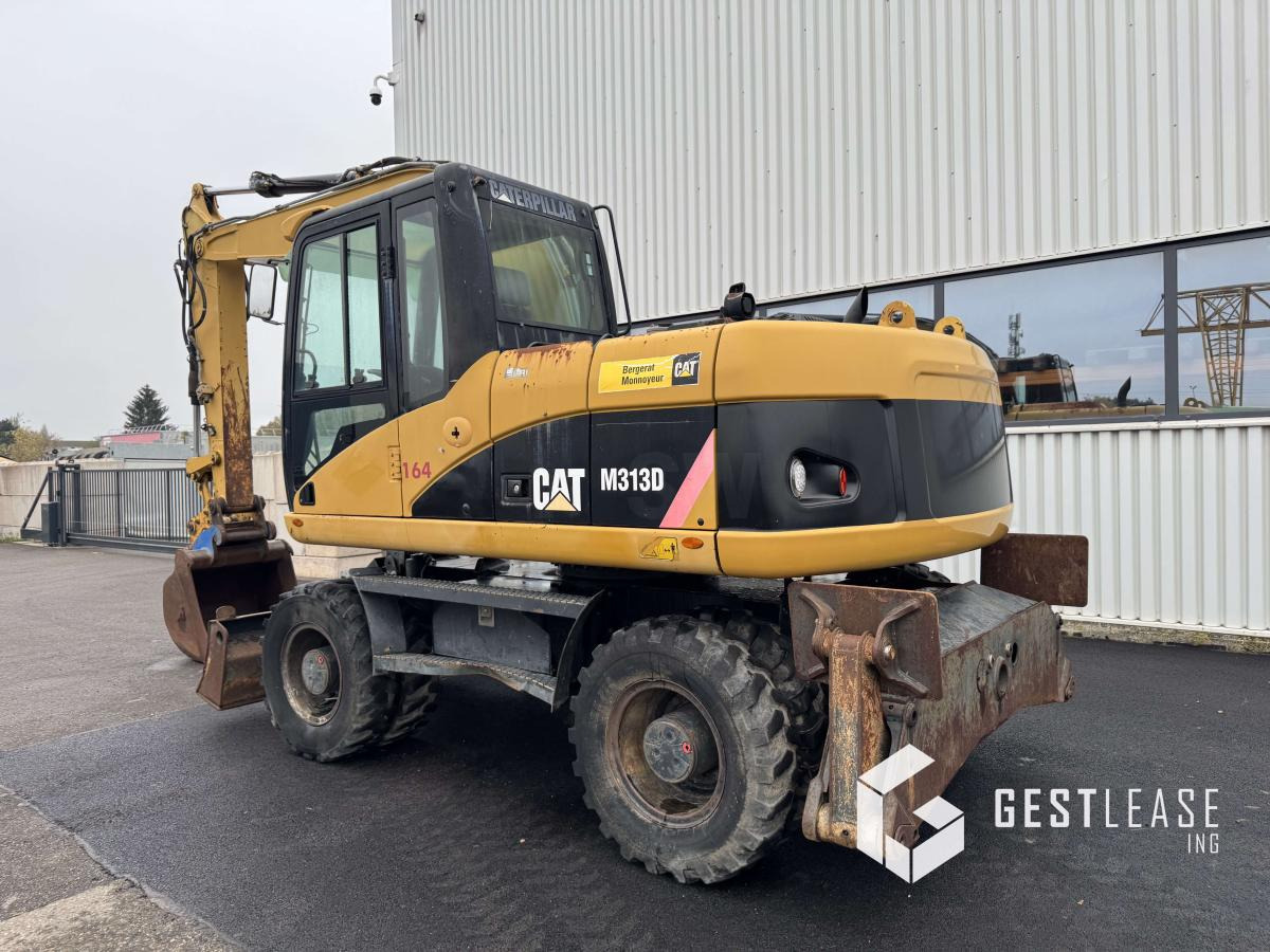 Caterpillar M313D Mono - Escavadeira de rodas: foto 2 Caterpillar M313D Mono - Escavadeira de rodas: foto 2