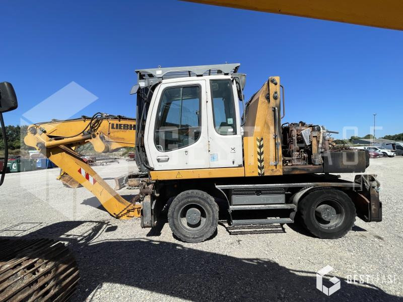 Liebherr A316 - Escavadeira de rodas: foto 1 Liebherr A316 - Escavadeira de rodas: foto 1