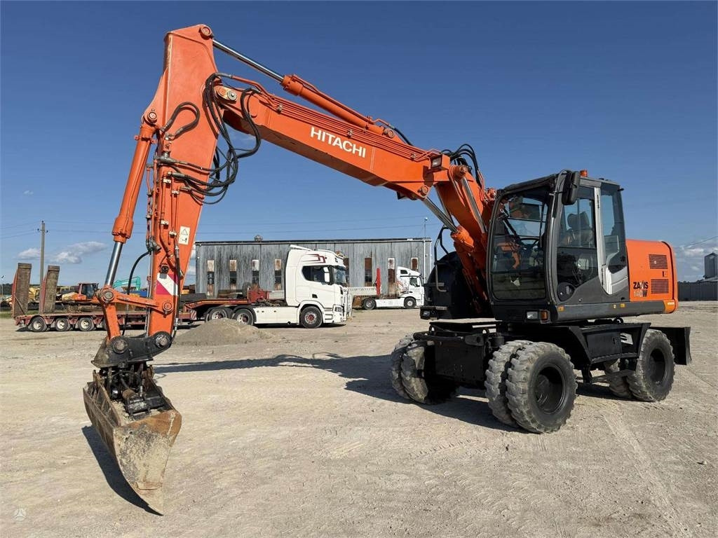 Hitachi ZX 140 W - Escavadeira de rodas: foto 2 Hitachi ZX 140 W - Escavadeira de rodas: foto 2