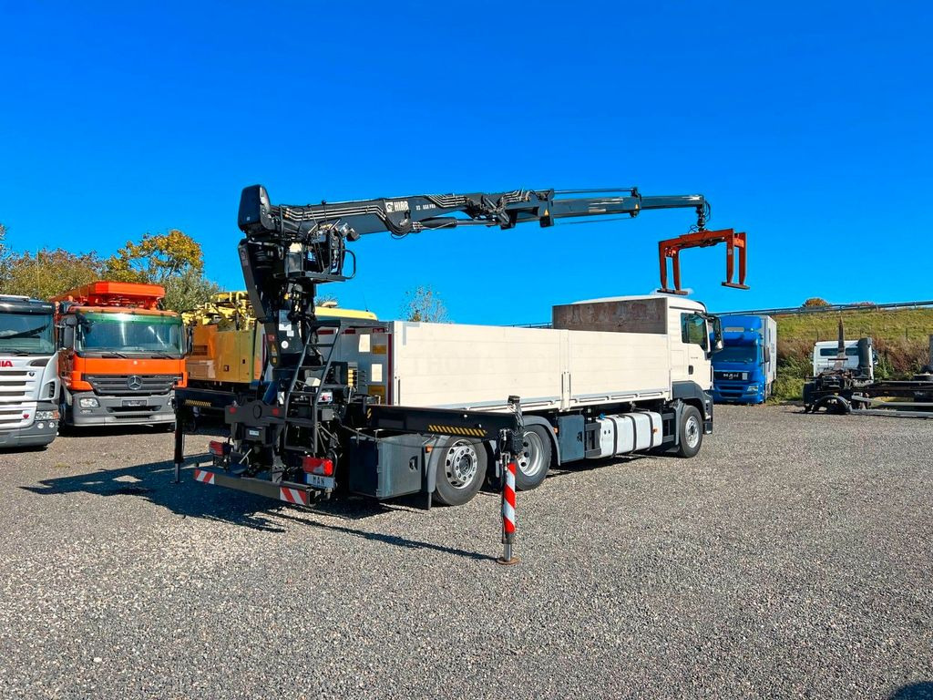 MAN 26.480 6X2 Baustoff mit Kran HIAB Top Zustand - Camião grua, Camião de caixa aberta/ Plataforma: foto 1 MAN 26.480 6X2 Baustoff mit Kran HIAB Top Zustand - Camião grua, Camião de caixa aberta/ Plataforma: foto 1