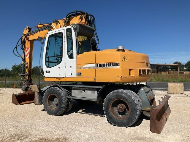 Liebherr A314 - Escavadeira de rodas: foto 3 Liebherr A314 - Escavadeira de rodas: foto 3