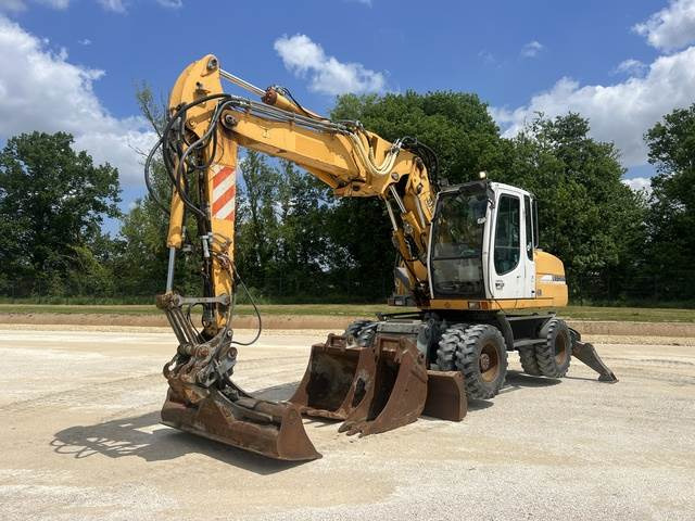 Liebherr A314 - Escavadeira de rodas: foto 1 Liebherr A314 - Escavadeira de rodas: foto 1