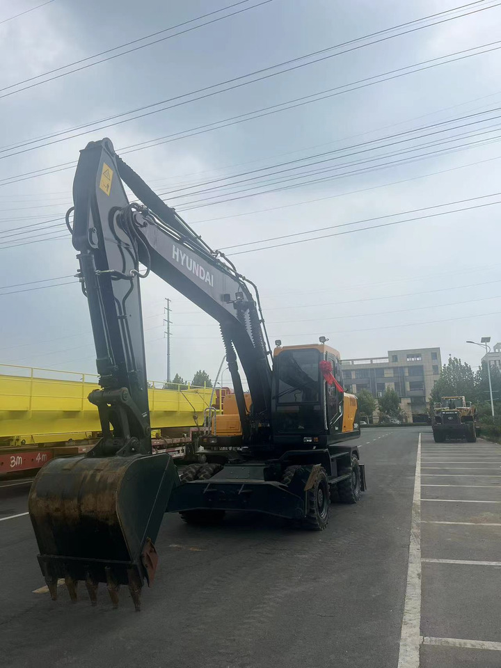 Escavadeira de rodas Hyundai 210W: foto 10