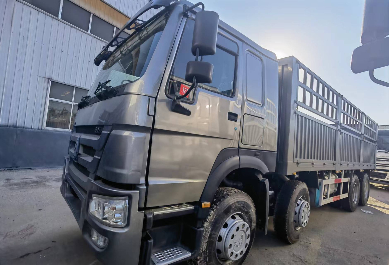 Sinotruk HOWO 371 8*4 Fence truck - Camião de caixa aberta/ Plataforma: foto 1 Sinotruk HOWO 371 8*4 Fence truck - Camião de caixa aberta/ Plataforma: foto 1