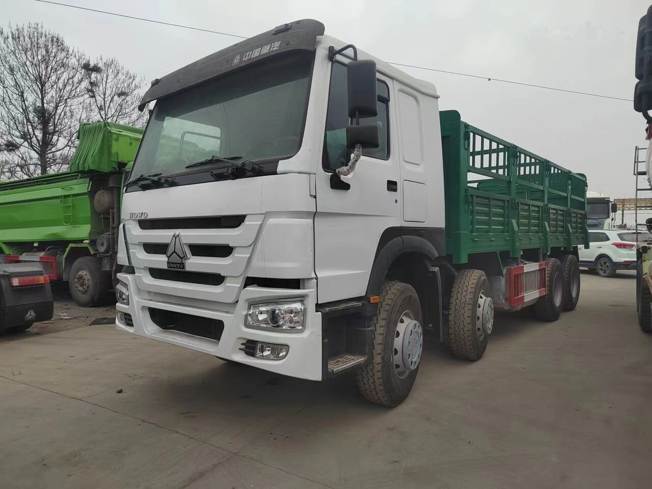 Sinotruk HOWO 8*4 Fence Truck - Camião de caixa aberta/ Plataforma: foto 1 Sinotruk HOWO 8*4 Fence Truck - Camião de caixa aberta/ Plataforma: foto 1