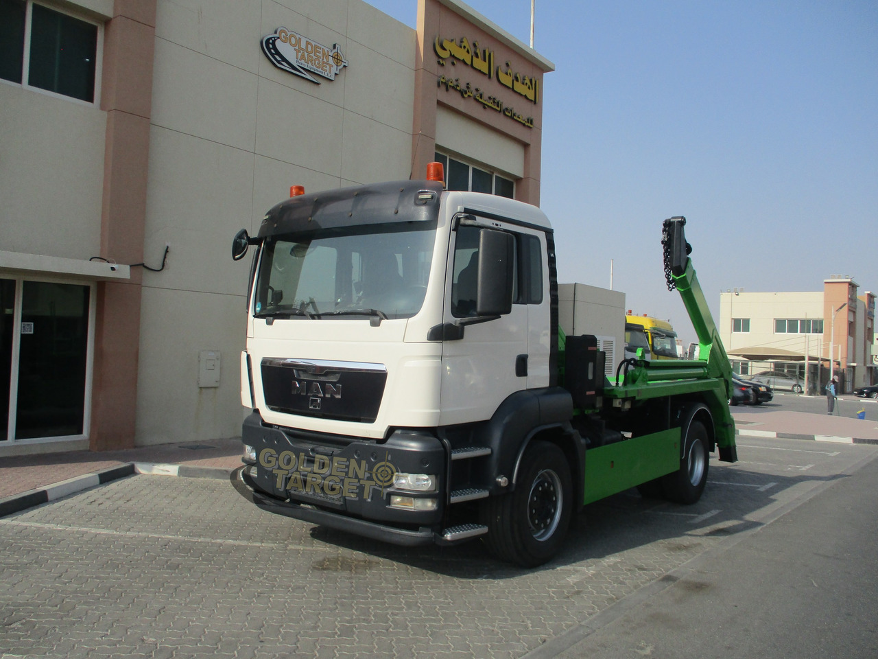 MAN TGS 18.440 4x2 Skip Loader - Camião multibenne: foto 2 MAN TGS 18.440 4x2 Skip Loader - Camião multibenne: foto 2