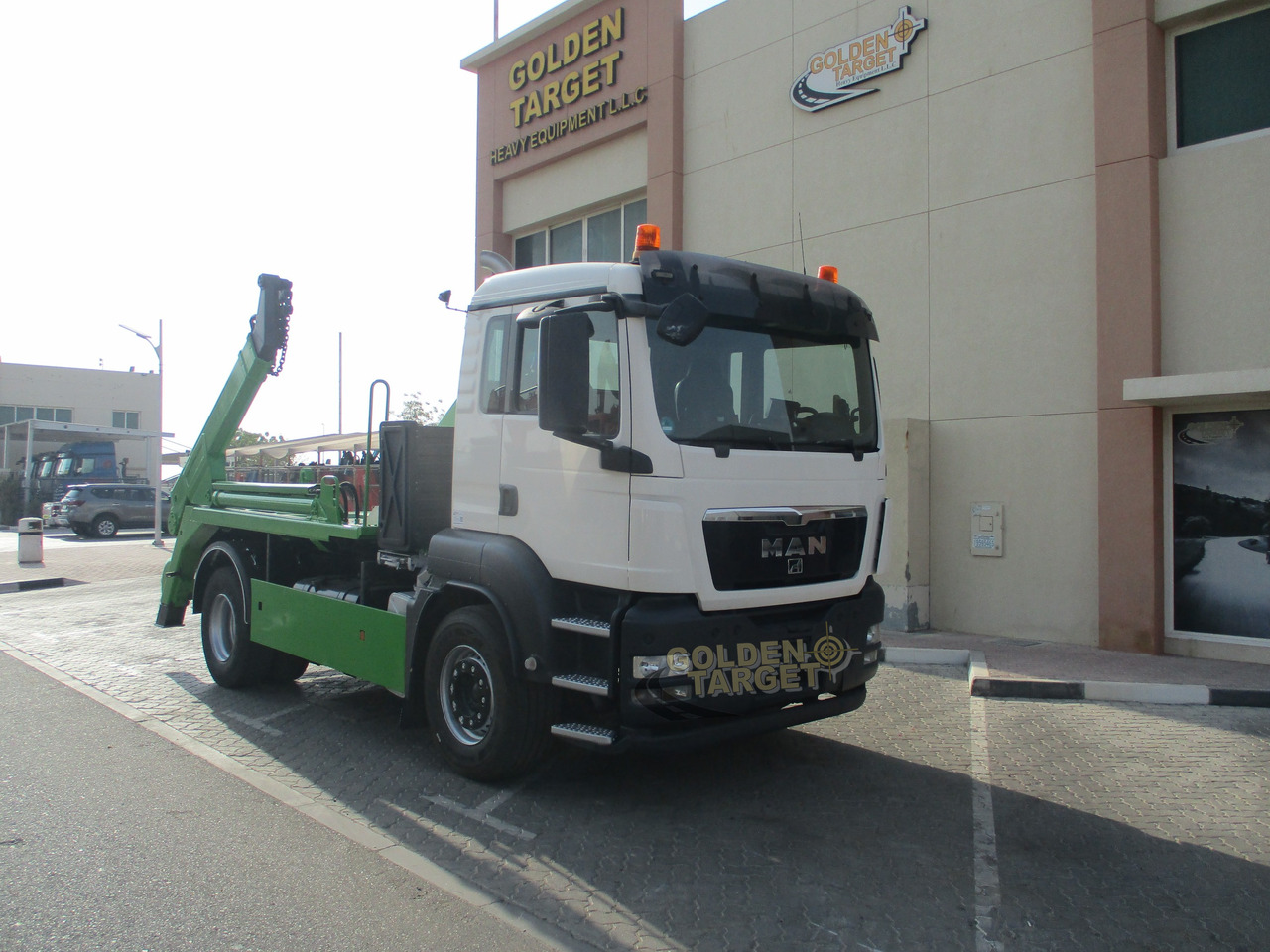 MAN TGS 18.440 4x2 Skip Loader - Camião multibenne: foto 1 MAN TGS 18.440 4x2 Skip Loader - Camião multibenne: foto 1
