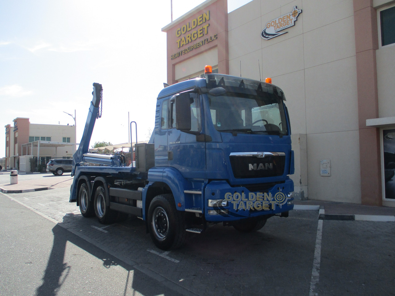 MAN TGS 26.440 6x4 Skip Loader - Camião multibenne: foto 1 MAN TGS 26.440 6x4 Skip Loader - Camião multibenne: foto 1
