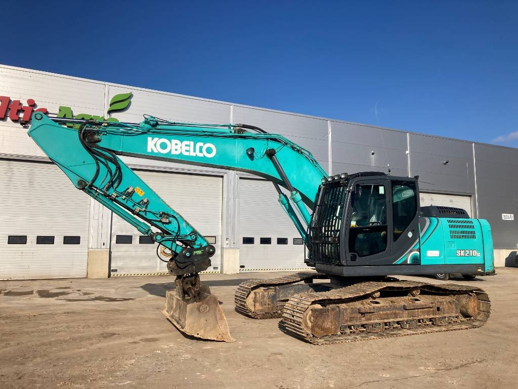 Kobelco SK 210 LC-10 - Escavadora de rastos: foto 1 Kobelco SK 210 LC-10 - Escavadora de rastos: foto 1