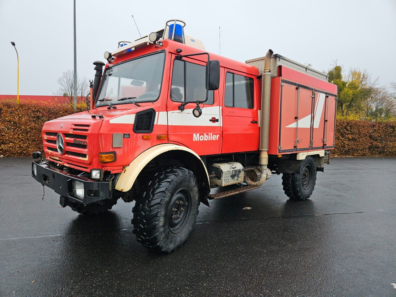 Unimog U4000 4x4 DOKA Tanklöschfahrzeug Feuerwehr - Caminhão tanque: foto 1 Unimog U4000 4x4 DOKA Tanklöschfahrzeug Feuerwehr - Caminhão tanque: foto 1