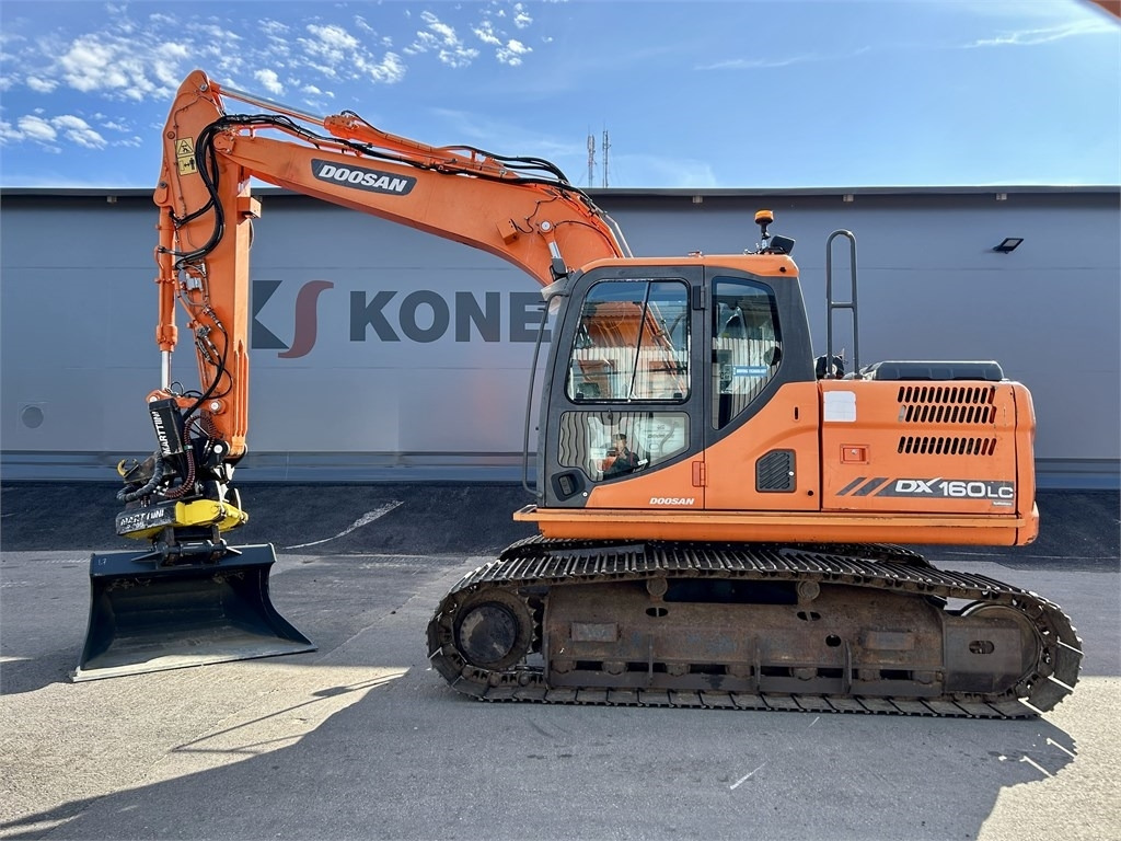 Doosan DX160LC-3 KALLISTAJA+PYÖRITTÄJÄ - Escavadora de rastos: foto 1 Doosan DX160LC-3 KALLISTAJA+PYÖRITTÄJÄ - Escavadora de rastos: foto 1