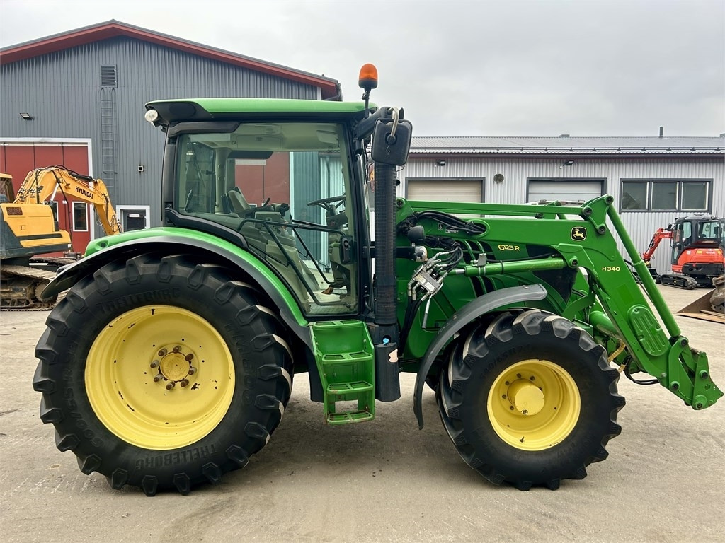 John Deere 6125 R AUTOPOWER ETUKUORMAAJALLA - Trator: foto 5 John Deere 6125 R AUTOPOWER ETUKUORMAAJALLA - Trator: foto 5