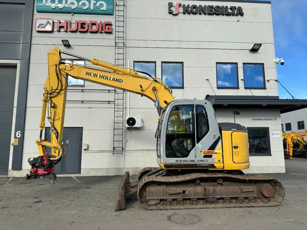 New Holland MYYTY! SOLD! E135BSR-2 PYÖRITTÄJÄLLÄ - Escavadora de rastos: foto 1 New Holland MYYTY! SOLD! E135BSR-2 PYÖRITTÄJÄLLÄ - Escavadora de rastos: foto 1