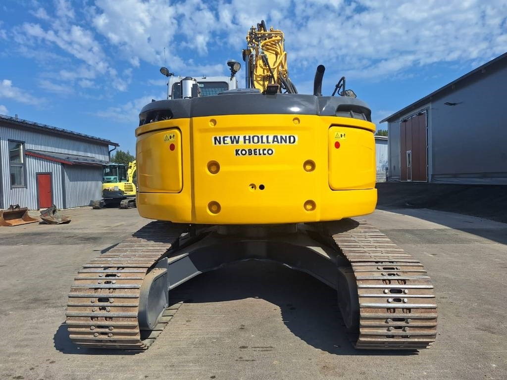New Holland MYYTY! SOLD! E235BSRLC PYÖRITTÄJÄLLÄ - Escavadora de rastos: foto 3 New Holland MYYTY! SOLD! E235BSRLC PYÖRITTÄJÄLLÄ - Escavadora de rastos: foto 3