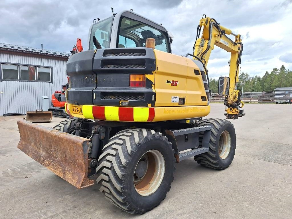 New Holland MYYTY! SOLD! MH2.6 ENGCON PIHDEILLÄ - Escavadeira de rodas: foto 4 New Holland MYYTY! SOLD! MH2.6 ENGCON PIHDEILLÄ - Escavadeira de rodas: foto 4