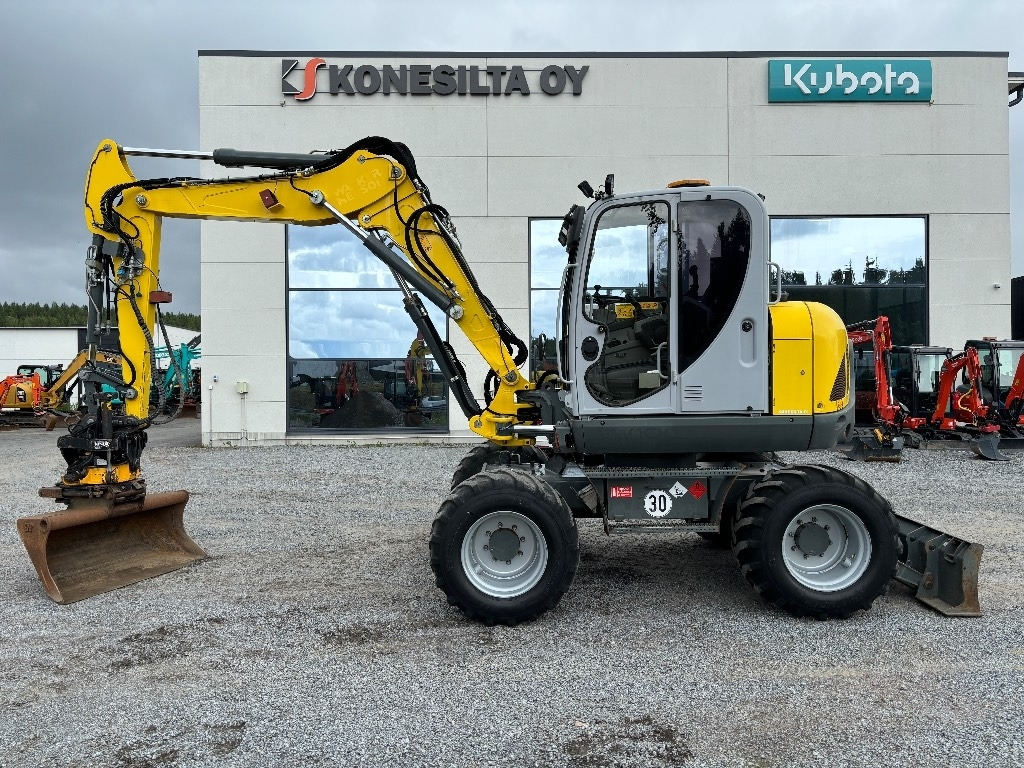Wacker Neuson EW 100 - Escavadeira de rodas: foto 1 Wacker Neuson EW 100 - Escavadeira de rodas: foto 1