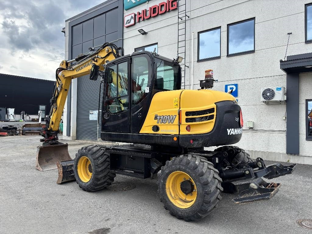 Yanmar B110W PYÖRITTÄJÄLLÄ - Escavadeira de rodas: foto 2 Yanmar B110W PYÖRITTÄJÄLLÄ - Escavadeira de rodas: foto 2