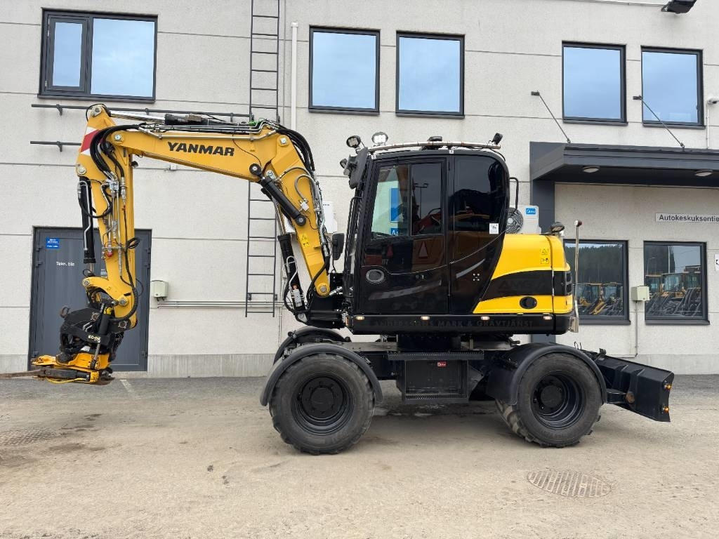 Yanmar B95W HUIPPUVARUSTEET - Escavadeira de rodas: foto 1 Yanmar B95W HUIPPUVARUSTEET - Escavadeira de rodas: foto 1