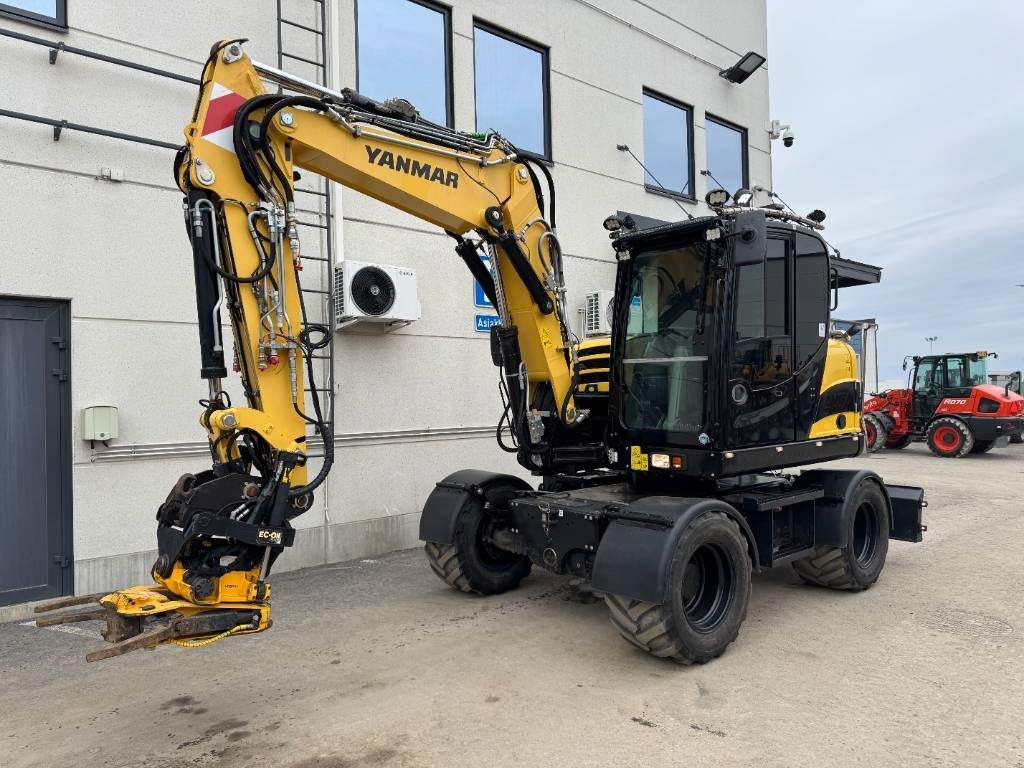 Yanmar B95W HUIPPUVARUSTEET - Escavadeira de rodas: foto 3 Yanmar B95W HUIPPUVARUSTEET - Escavadeira de rodas: foto 3