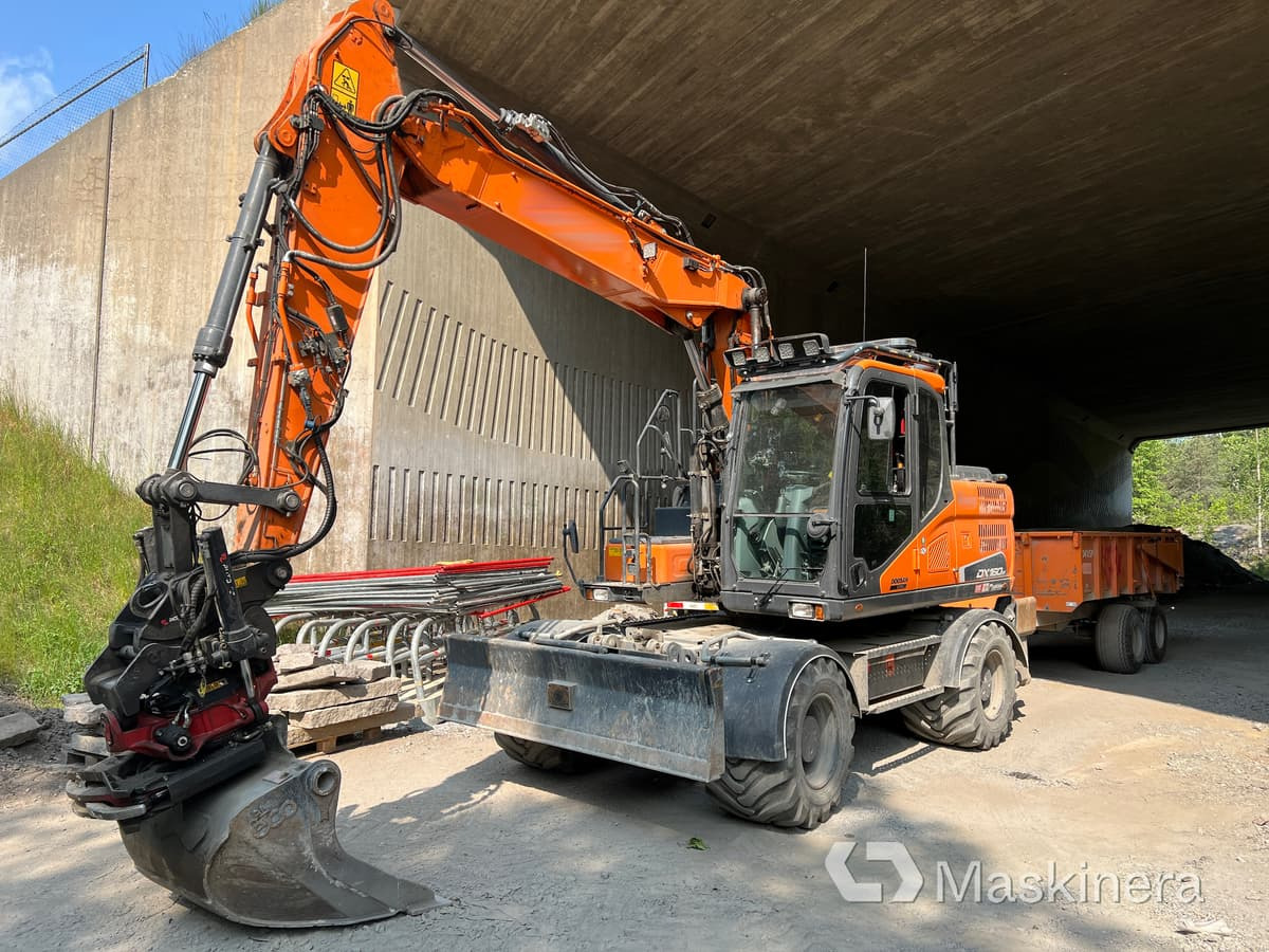 Hjulgrävare Doosan DX160W med tillbehör - Escavadora de rastos: foto 1 Hjulgrävare Doosan DX160W med tillbehör - Escavadora de rastos: foto 1
