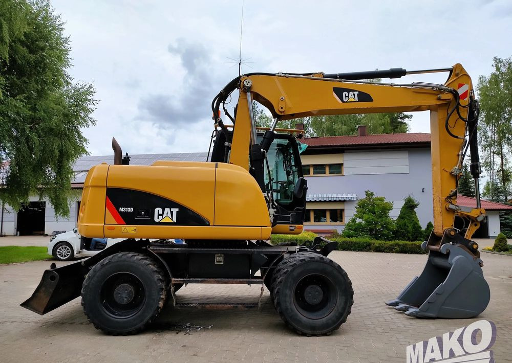 Caterpillar M313D - Escavadeira de rodas: foto 5 Caterpillar M313D - Escavadeira de rodas: foto 5