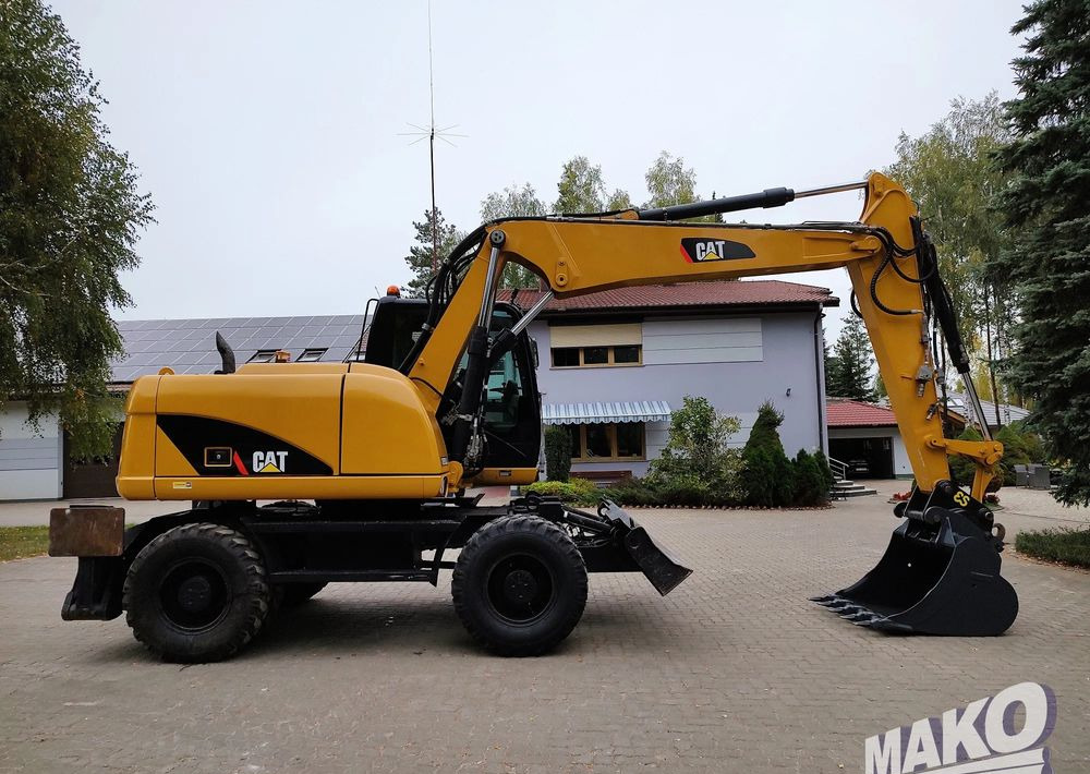 Caterpillar M313D - Escavadeira de rodas: foto 5 Caterpillar M313D - Escavadeira de rodas: foto 5