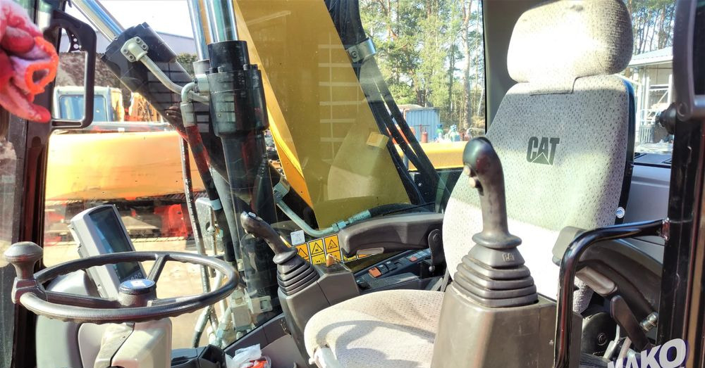 Escavadeira de rodas Caterpillar M313D: foto 11