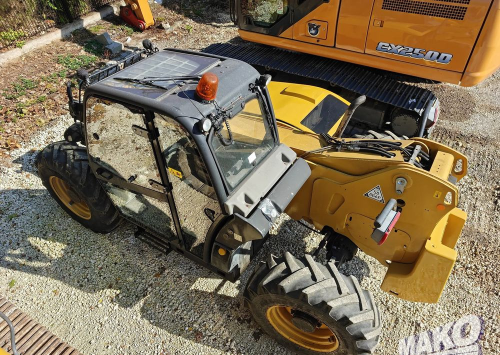 Caterpillar TH407 - Empilhador telescópico: foto 2 Caterpillar TH407 - Empilhador telescópico: foto 2