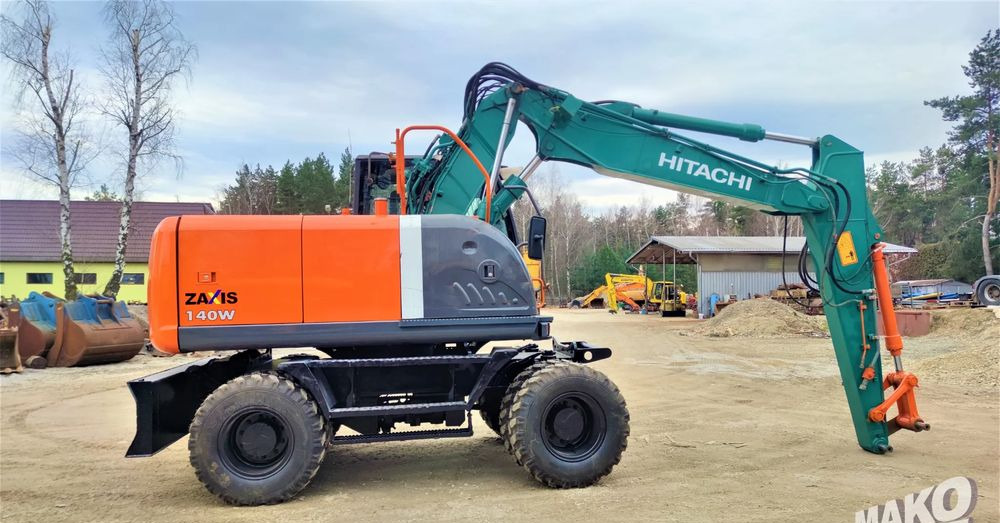 Hitachi ZX140W-3 - Escavadeira de rodas: foto 5 Hitachi ZX140W-3 - Escavadeira de rodas: foto 5