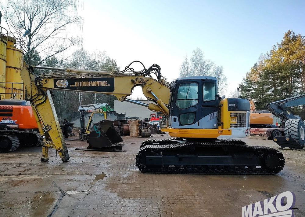 Komatsu PC228USLC-3 - Escavadora de rastos: foto 1 Komatsu PC228USLC-3 - Escavadora de rastos: foto 1