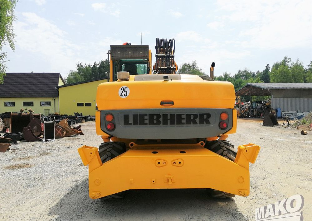 Liebherr A 314 Litronic - Escavadeira de rodas: foto 4 Liebherr A 314 Litronic - Escavadeira de rodas: foto 4