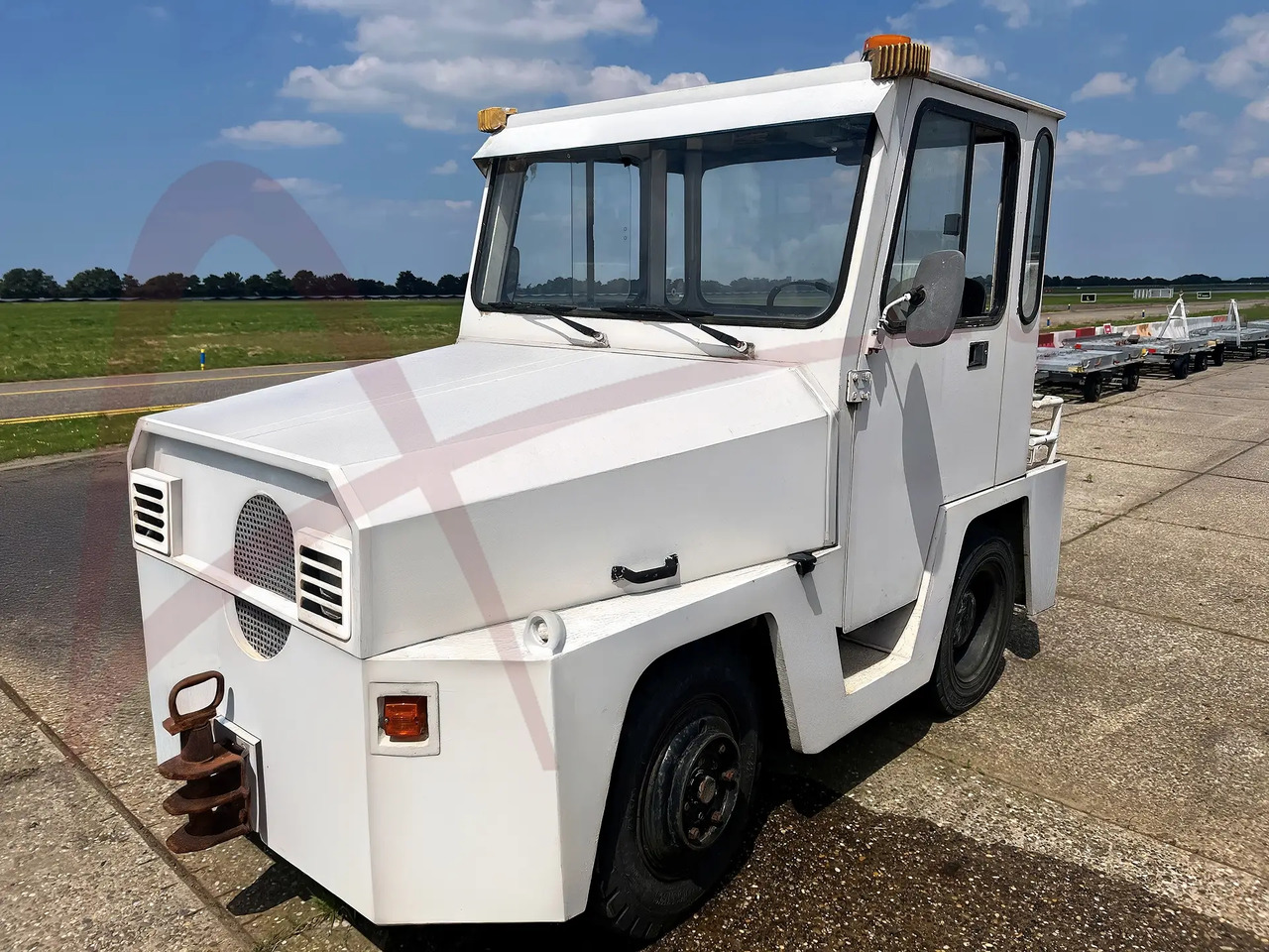 Mulag Comet 5 - Trator de bagagem: foto 1 Mulag Comet 5 - Trator de bagagem: foto 1