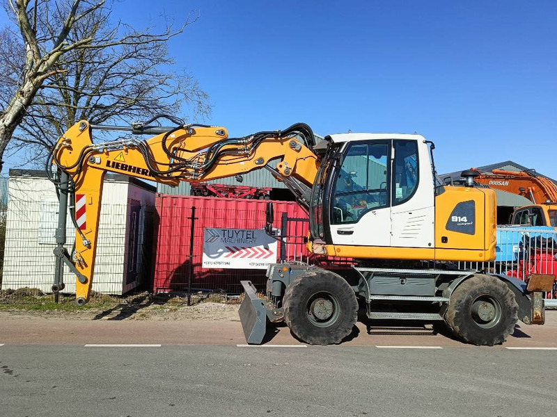 Liebherr A 914 compact mobiele graafmachine excavator 18Ton - Escavadeira de rodas: foto 1 Liebherr A 914 compact mobiele graafmachine excavator 18Ton - Escavadeira de rodas: foto 1