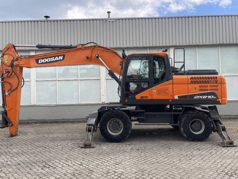 Doosan DX 210 W-5 2020 CE - Escavadeira de rodas: foto 1 Doosan DX 210 W-5 2020 CE - Escavadeira de rodas: foto 1