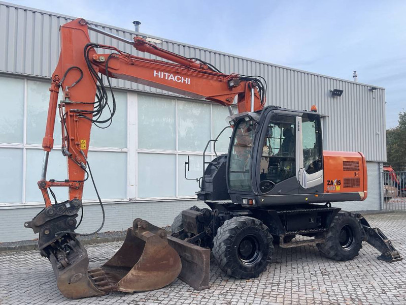 Hitachi ZX 140 W-3 - Escavadeira de rodas: foto 1 Hitachi ZX 140 W-3 - Escavadeira de rodas: foto 1