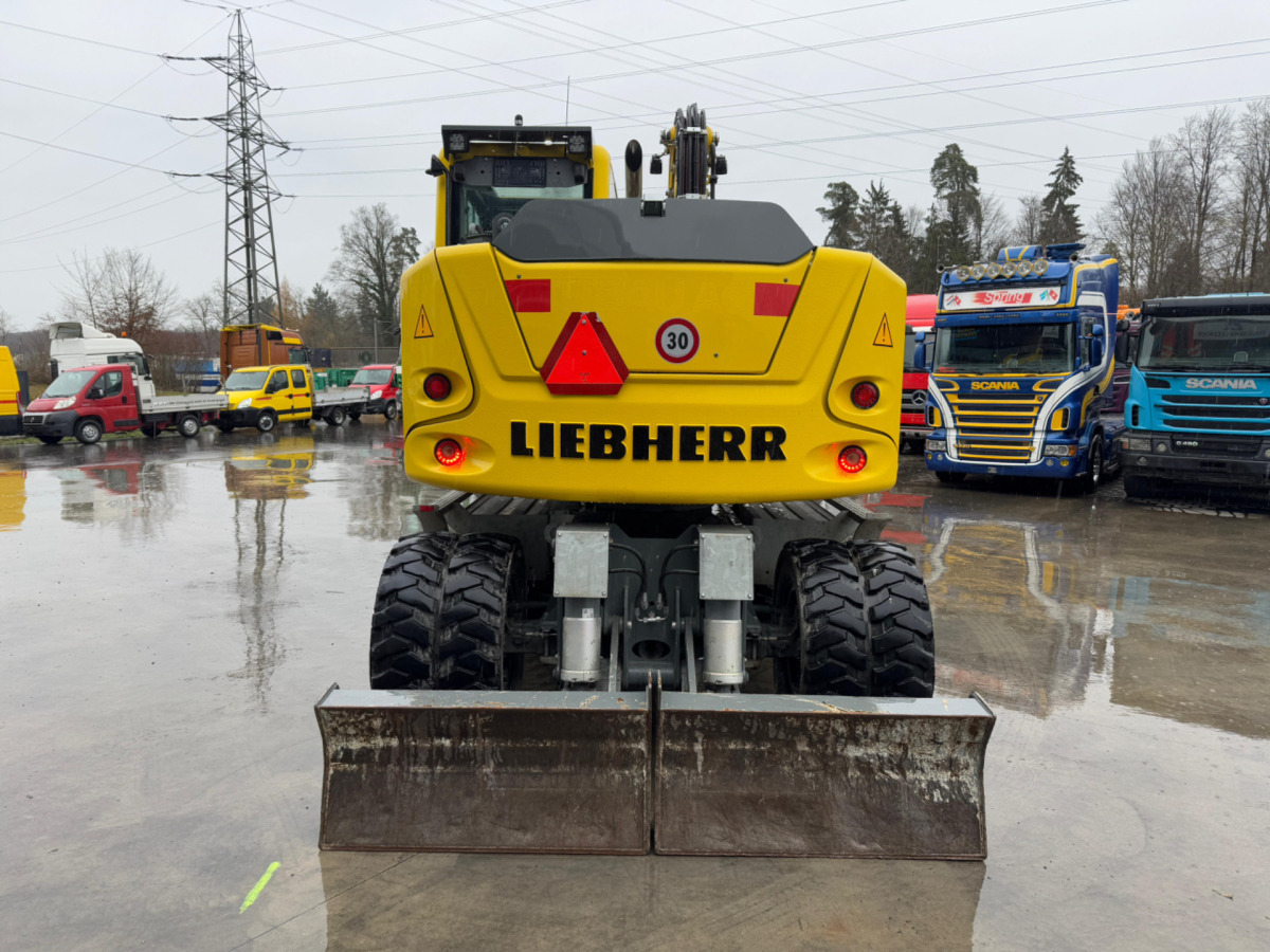 LIEBHERR 910 Compact Litronic Powertilt - Escavadeira de rodas: foto 5 LIEBHERR 910 Compact Litronic Powertilt - Escavadeira de rodas: foto 5