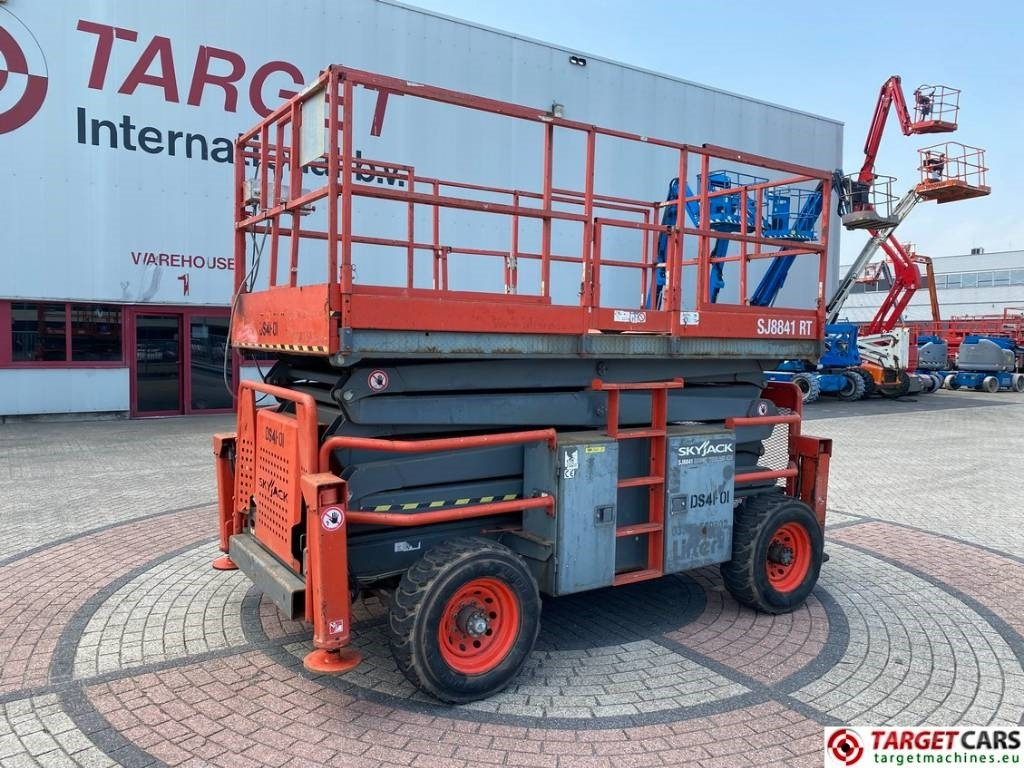 SkyJack SJ8841 RT Diesel 4x4 Scissor Work Lift 1430cm - Plataforma de Tijera/ Plataforma de tesoura: foto 1 SkyJack SJ8841 RT Diesel 4x4 Scissor Work Lift 1430cm - Plataforma de Tijera/ Plataforma de tesoura: foto 1