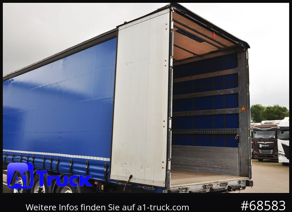 SCHMITZ SCS, Bordwandsider, Steckrungen, Liftachse, verzinkt - Semi-reboque de lona: foto 4 SCHMITZ SCS, Bordwandsider, Steckrungen, Liftachse, verzinkt - Semi-reboque de lona: foto 4