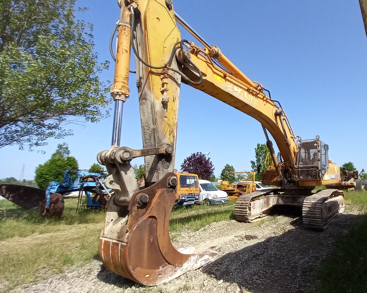 CASE Poclain 9046 Escavatore cingolato completo di cabina Rops-Fops con griglia frontale. Impianto martello. Benna. - Escavadora de rastos: foto 1 CASE Poclain 9046 Escavatore cingolato completo di cabina Rops-Fops con griglia frontale. Impianto martello. Benna. - Escavadora de rastos: foto 1