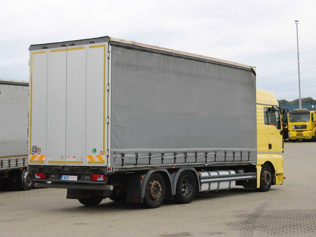 MAN TGX 24.440, EURO 5EEV, 6X2, AIR SUSPENSION - Camião de lona: foto 4 MAN TGX 24.440, EURO 5EEV, 6X2, AIR SUSPENSION - Camião de lona: foto 4