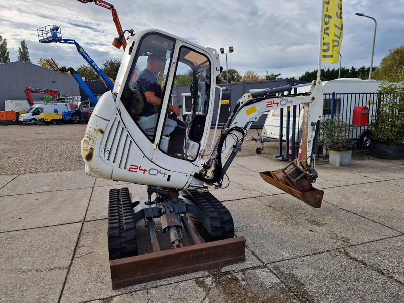 WACKER NEUSON 2404RD, kan op een berghelling draaien - Mini escavadeira: foto 1 WACKER NEUSON 2404RD, kan op een berghelling draaien - Mini escavadeira: foto 1