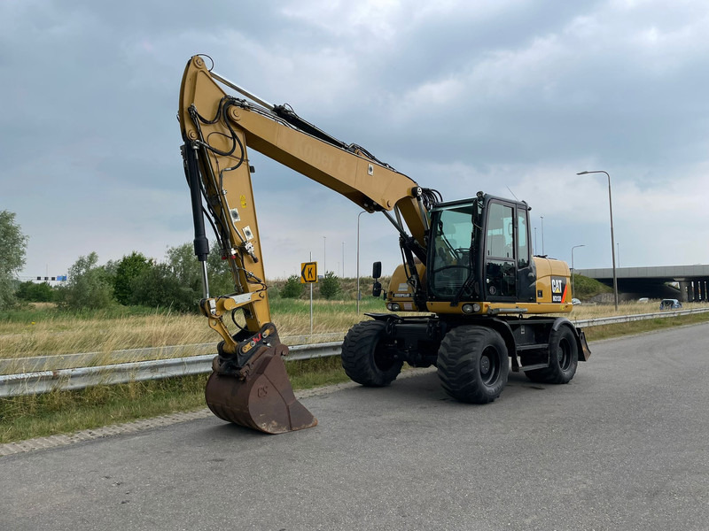 Caterpillar M313D - CE - Escavadeira de rodas: foto 3 Caterpillar M313D - CE - Escavadeira de rodas: foto 3