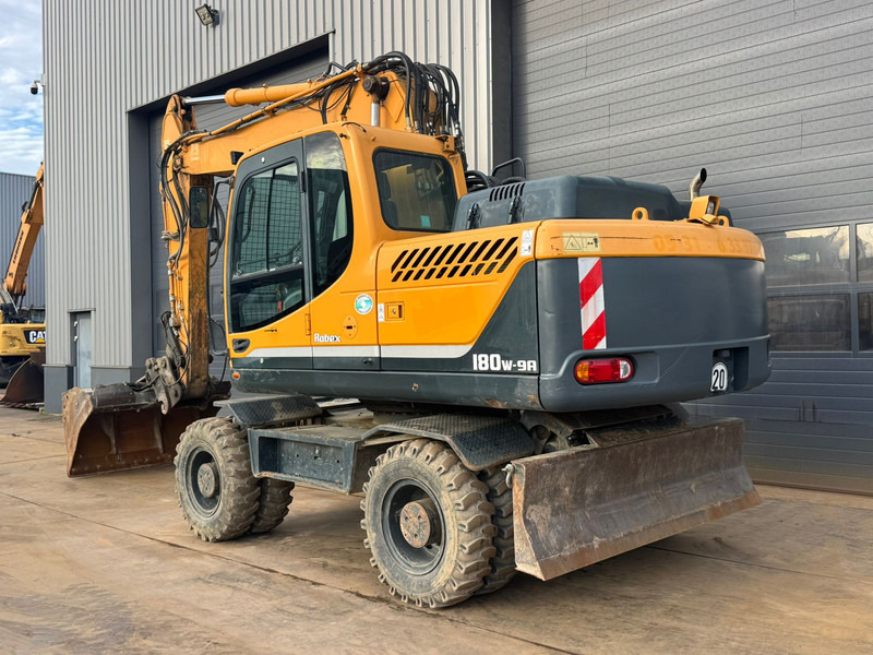 Hyundai Robex 180W-9A - Escavadeira de rodas: foto 3 Hyundai Robex 180W-9A - Escavadeira de rodas: foto 3