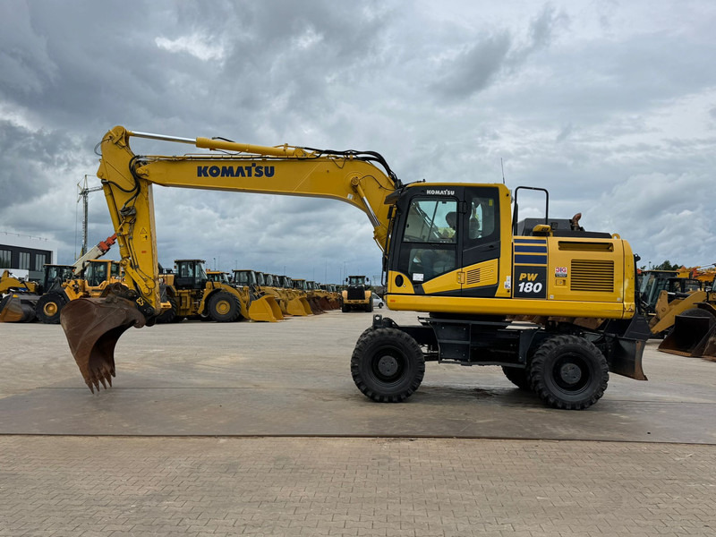 Komatsu PW180-11 - Escavadeira de rodas: foto 1 Komatsu PW180-11 - Escavadeira de rodas: foto 1
