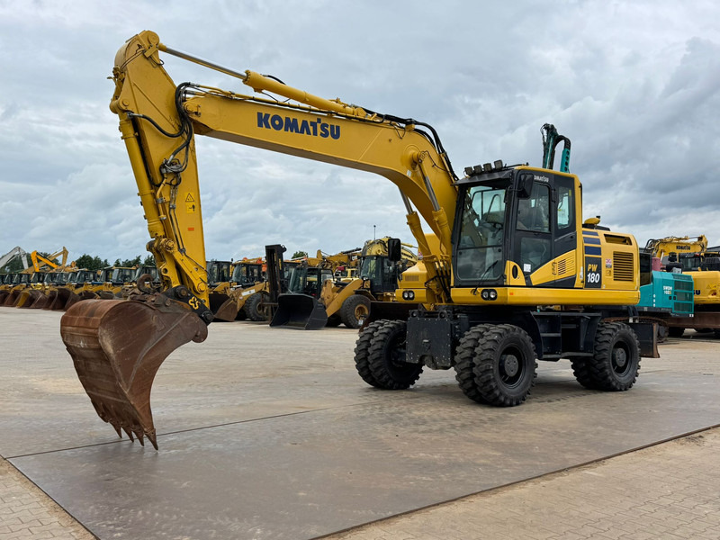 Komatsu PW180-11 - Escavadeira de rodas: foto 2 Komatsu PW180-11 - Escavadeira de rodas: foto 2