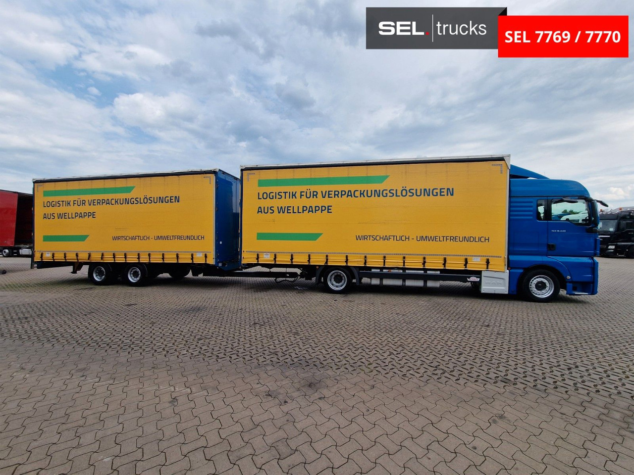 MAN TGX 18.440 4X2 LL-U/ Intarder/ Hubdach/Durchlade - Camião de lona: foto 4 MAN TGX 18.440 4X2 LL-U/ Intarder/ Hubdach/Durchlade - Camião de lona: foto 4